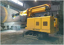 Debricking machines with lifting arm